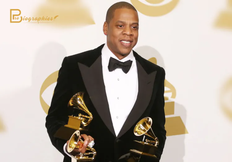 Jay-z holding Grammy award